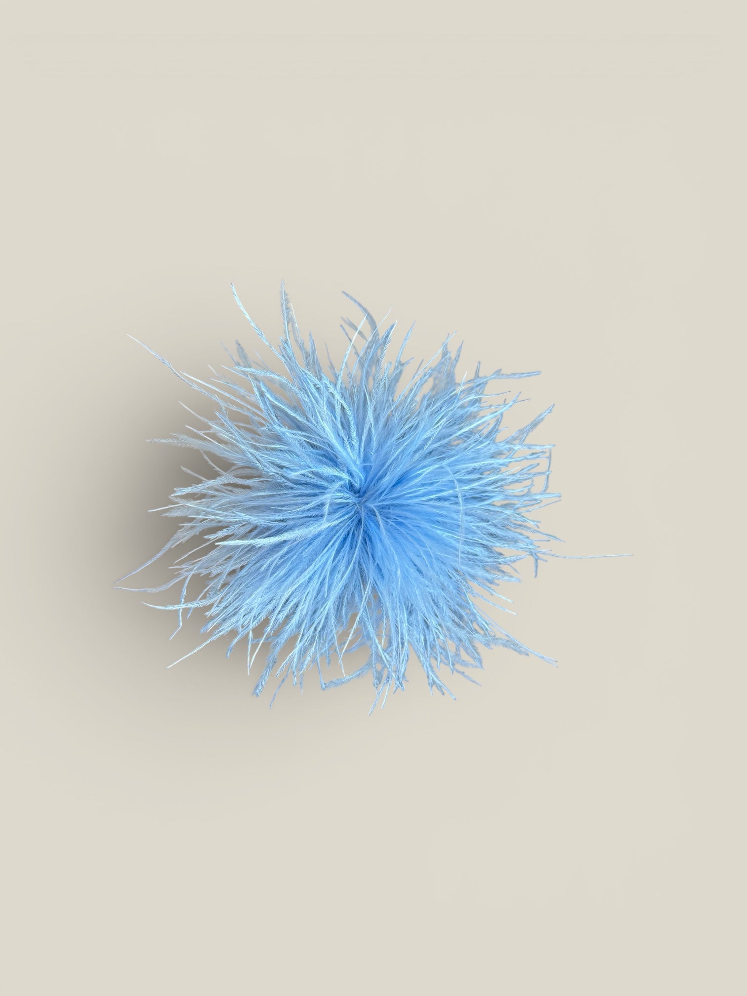 Tocado Pompón azul bebé