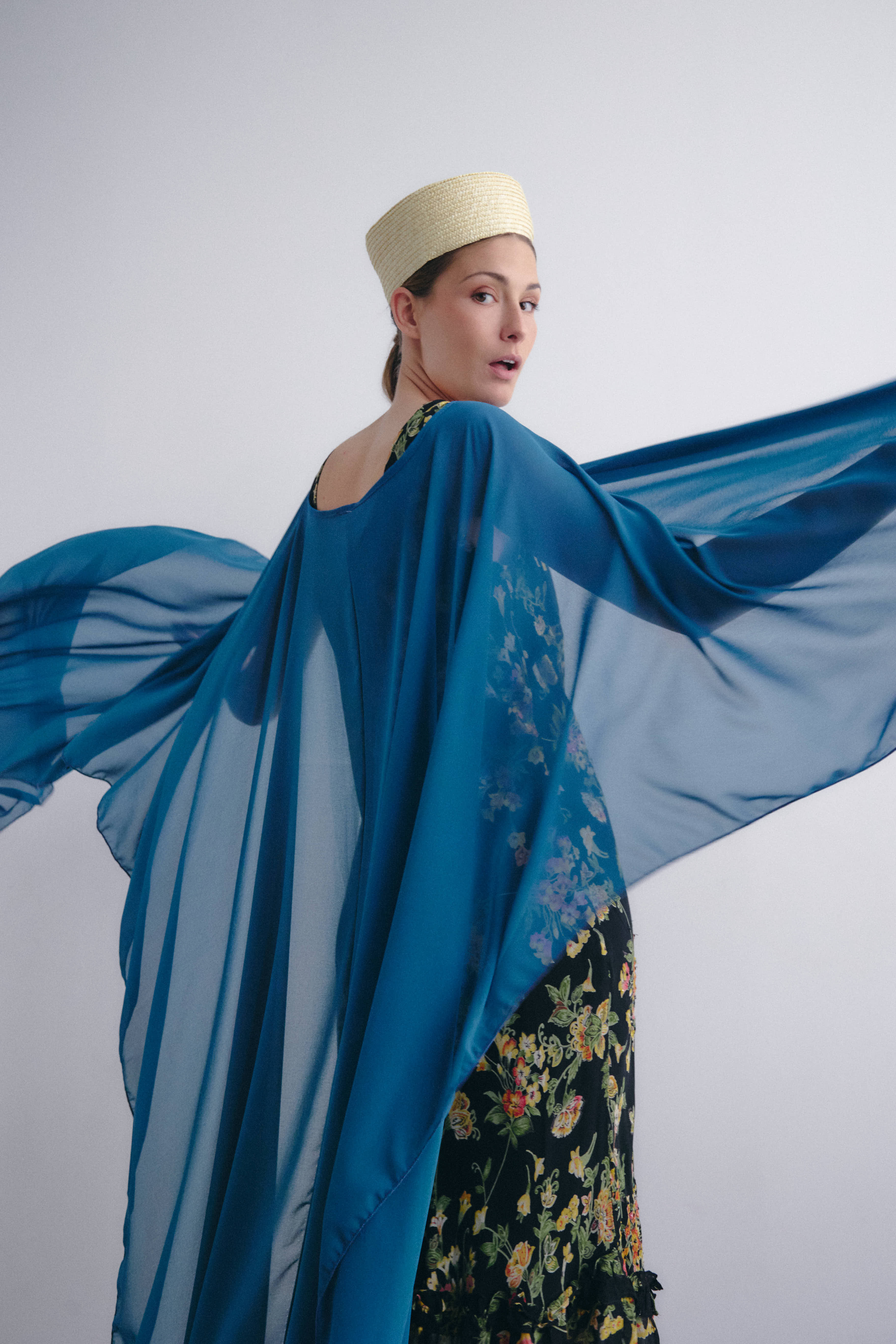 Long petroleum crepe cape