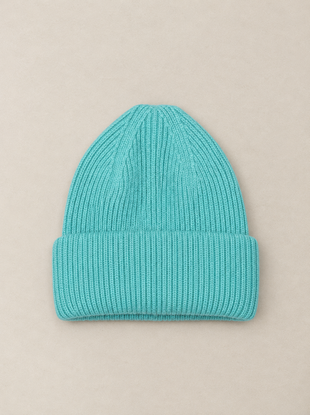 Bonnet en maille couleur aigue-marine