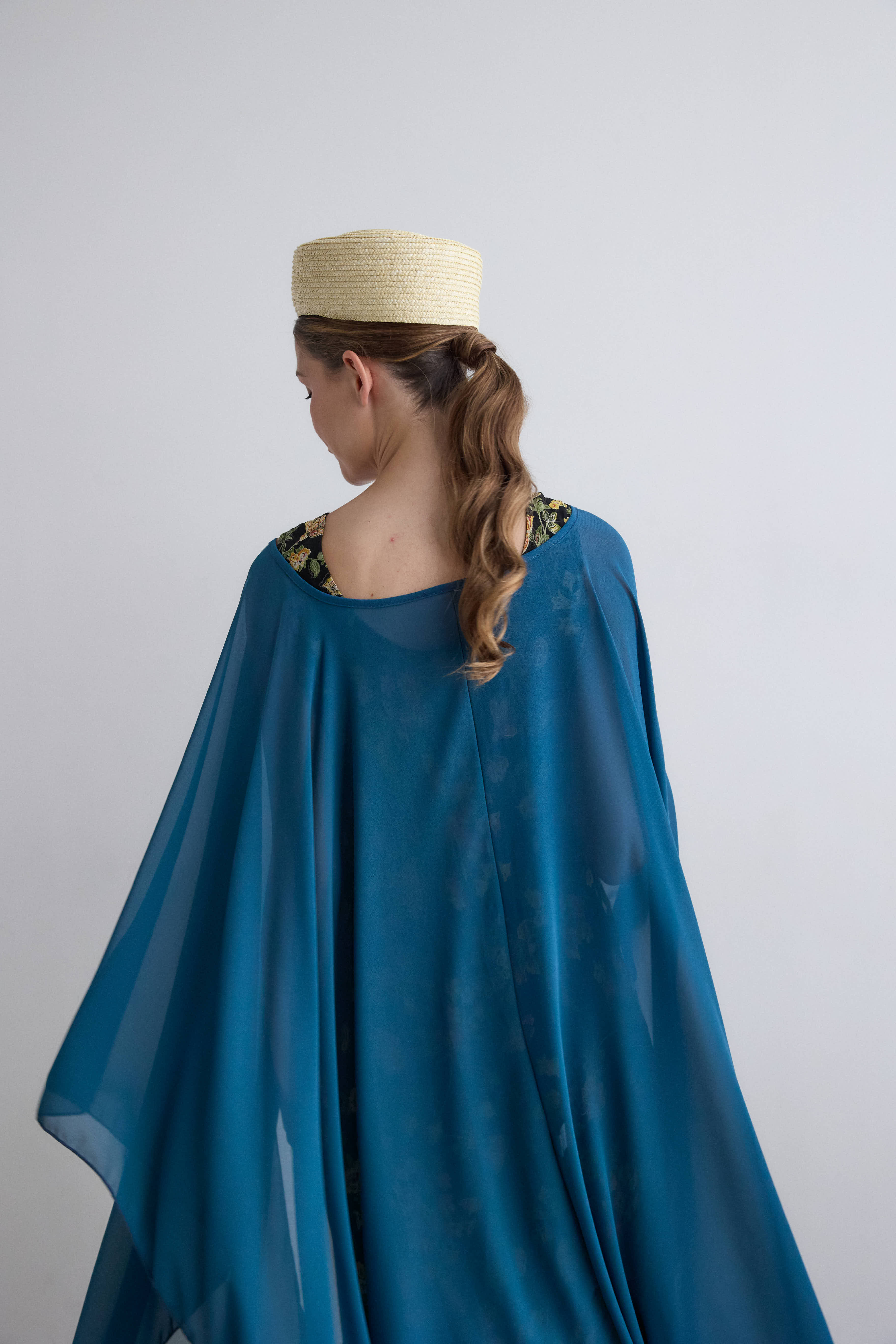 Long petroleum crepe cape