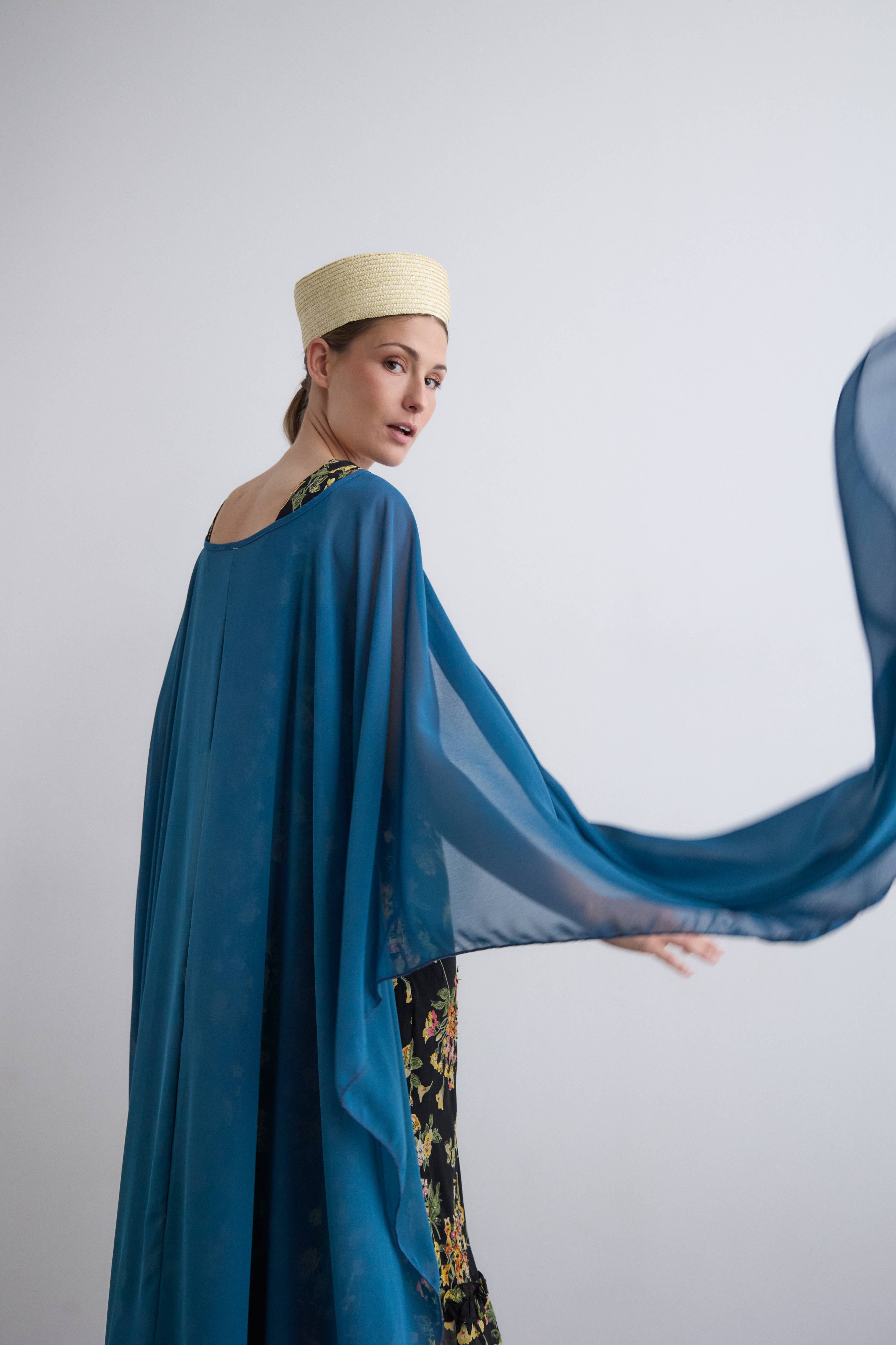 Long petroleum crepe cape