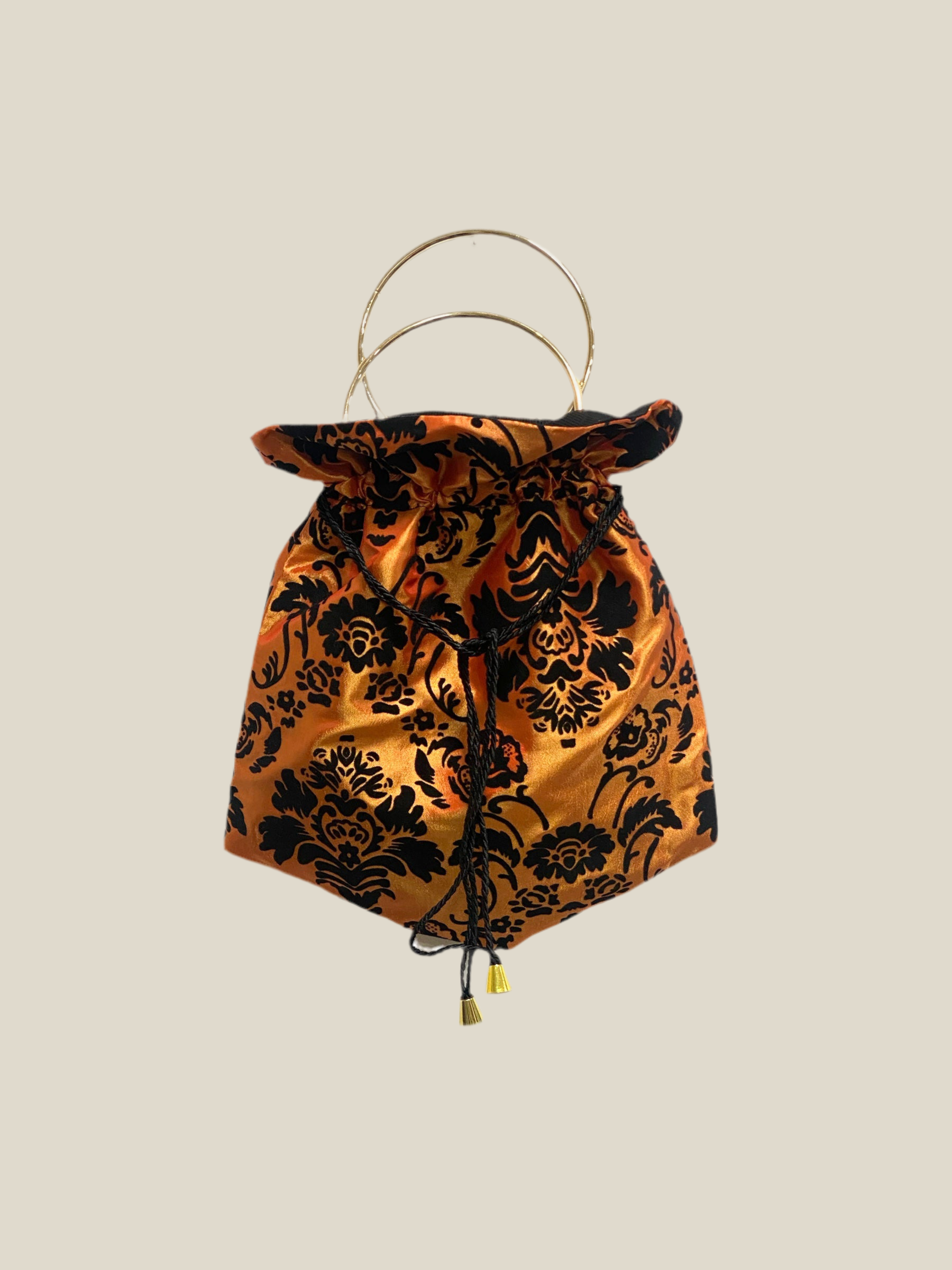 Orange brocade sack bag