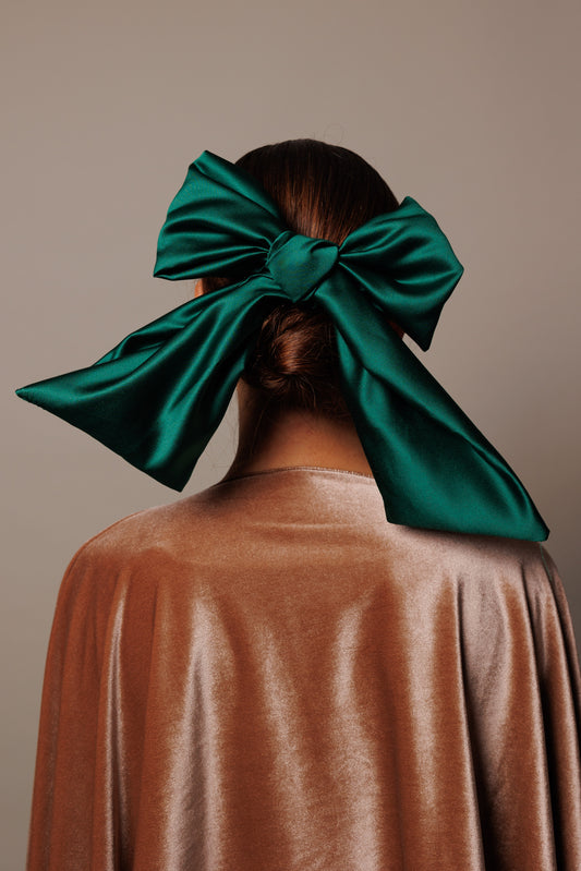 Green satin ribbon bow