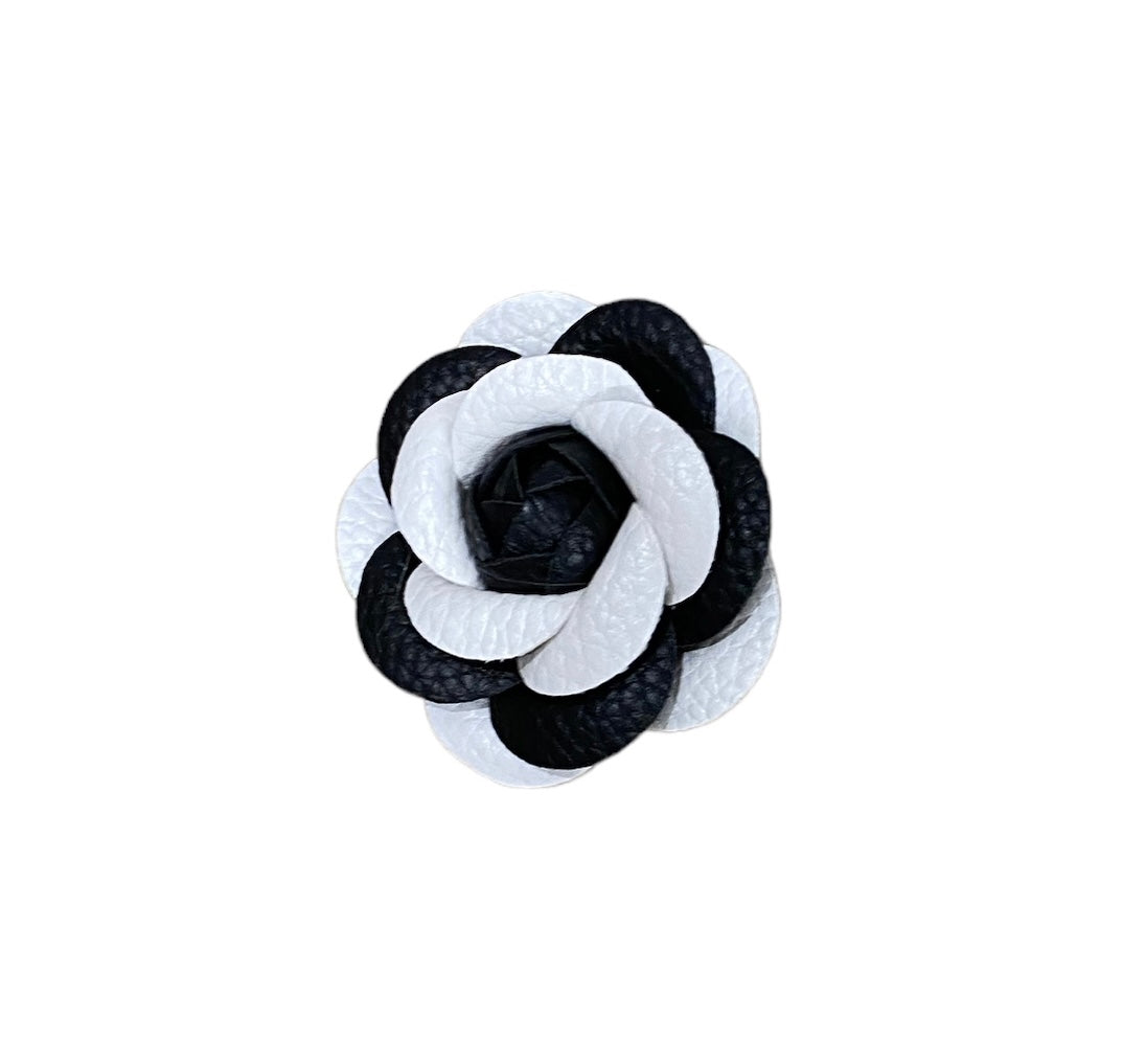 Black and white camellia brooch